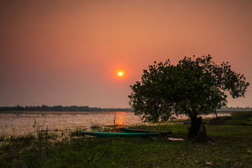 Beautiful sunset on the marsh in countryside of Thailand.