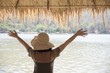 Happy lady during vacation at water site nature - happy woman vacation concept