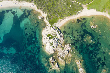 Wall Mural - View from above, stunning aerial view of a wild beach bathed by a beautiful turquoise sea. Costa Smeralda (Emerald Coast) Sardinia, Italy.