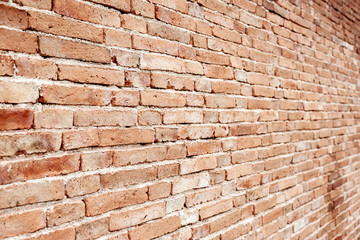 Old red  brick wall background with  perspective