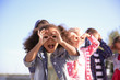 © Pixel-Shot - Group of happy children having fun outdoors