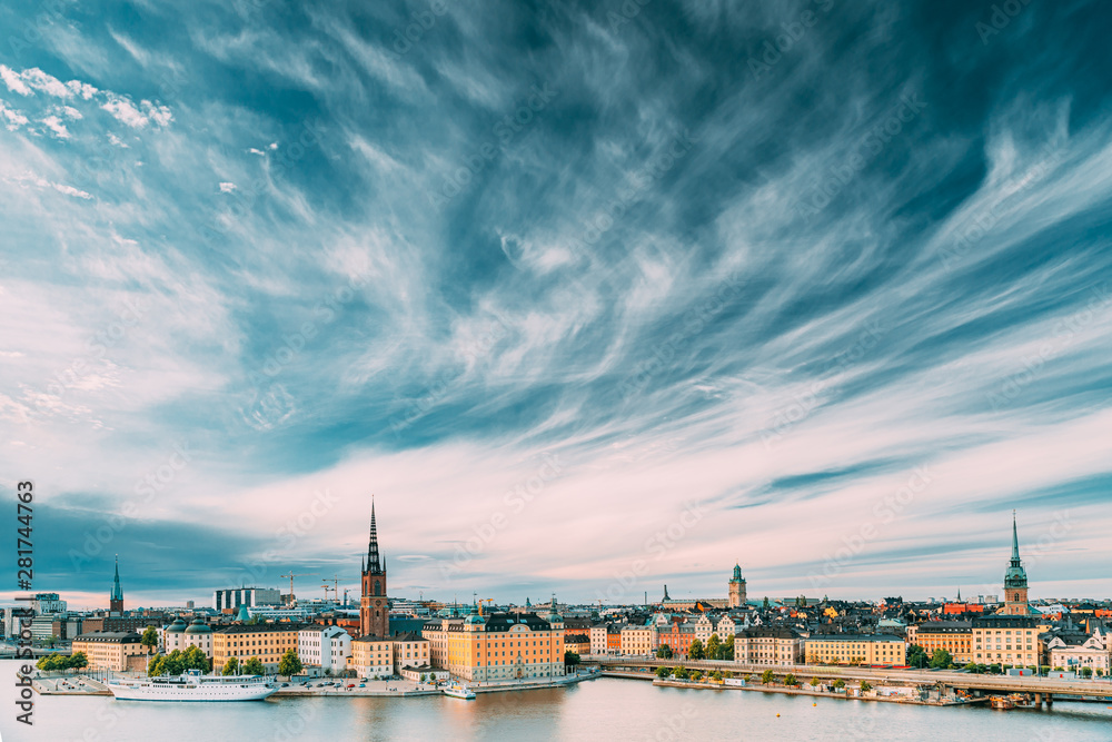 Stockholm, Sweden. Scenic Famous View Of Embankment In Old Town Of Stockholm At Summer. Gamla Stan In Summer Evening. Famous Popular Destination Scenic Place And UNESCO World Heritage Site - obrazy, fototapety, plakaty 