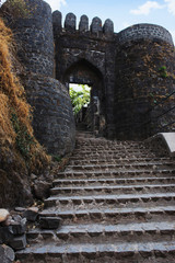 PUNE, MAHARASHTRA, January 2019, Tourist at entrance gate and steps of Sinhagad Fort.