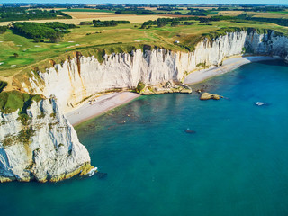 Canvas Print - Picturesque landscape of white chalk cliffs and natural arches of Etretat, France