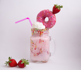 Wall Mural - Delicious dessert strawberry smoothie with pink bagel and cream