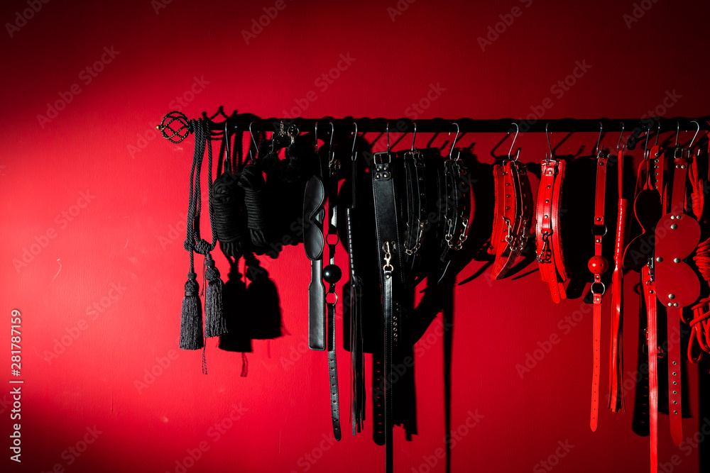 erotic games and human sexuality concept. kinky sex toys for BDSM fantasy  play (ball gag, cuffs, rope, flogger, collar and leash) Stock-bilde