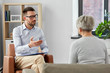 © Syda Productions - geriatric psychology, mental therapy and old age concept - psychologist talking to senior woman patient at psychotherapy session