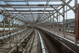 Fototapeta Miasto - tunnel of monorail road view from front window of a moving train running