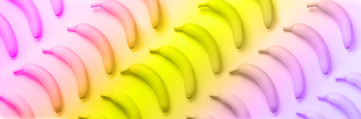 Wall Mural - geometric colorful fruit pattern. bananas over rainbow gradient background. banner. top view. pop ar