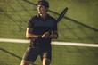 © Jacob Lund - Tennis player practicing tennis on a club court
