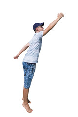 Side view full length portrait of a casual young man wearing a hat hand stretched trying to reach to something isolated over white background.