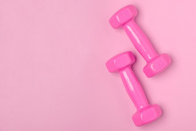 Top View On Pink Dumbbells