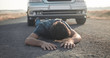 © andranik123 - Caucasian injured man lying on asphalt.