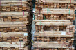 Close up manufacturing shot of wooden furniture parts on a pallet at a factory in southern Vietnam