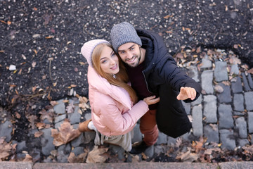 Canvas Print - Young romantic couple outdoors