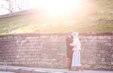 Poster - Young romantic couple hugging outdoors