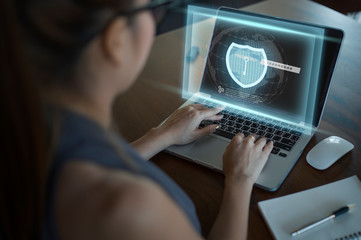 Young women using computer, Cyber security concept.