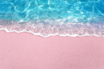 tropical pink sandy beach and clear turquoise water