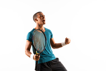 Afro American tennis player man over isolated white background .