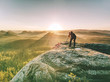 © rdonar - Photographer traveler with professional photo equipment works