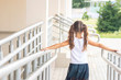 © Alex Desanshe - first day of school. Girl schoolgirl goes to first grade. Girl playing, running after school