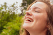 © Sean David - closeup of smiling young girl in nature