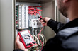 © romaset - Electrical measurements with multimeter tester