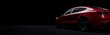 canvas print picture - Red sports car on elegant dark background.