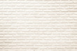 © Phokin - Wall cream brick wall texture background in room at subway. Brickwork stonework interior, rock old clean concrete grid uneven abstract weathered bricks tile design, horizontal architecture wall.