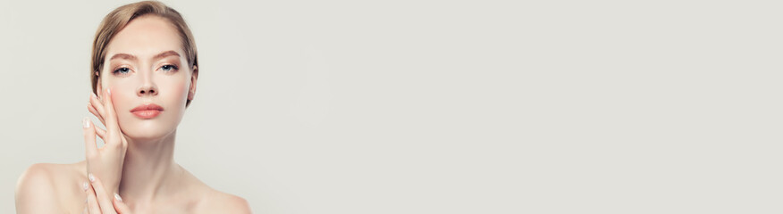 beautiful young woman with healthy skin on white banner background