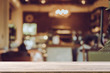 © successphoto - Empty wooden table blurred of restaurant cafe background and reception room, can be used for display or montage your products