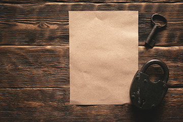 Wall Mural - top secret document with confidential information template on a wooden table flat lay background.