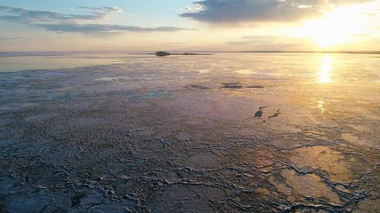 Wall Mural - Bright colorful sunset over the frozen sea