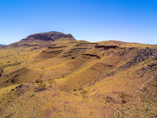 Wall Mural - Aerial view of hiking path leading towards top of Mount Bruce at Karijini National Park