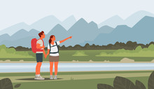 Happy Couple Of Young People Go Hiking. Man And Woman With Backpacks On A Background Of Mountainous Landscape
