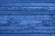 blue wood weathered background with knots and nail holes, close up