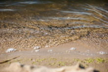 Brown Transparent Water Texture With Sandy River Bottom