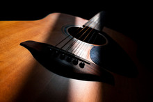 Acoustic Guitar Detail On Black Background