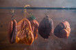 © gkrphoto - Smoked pork in a homemade smokehouse