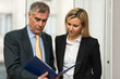 © Minerva Studio - Business people reading a document