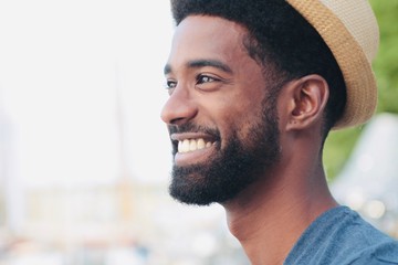 Canvas Print - Beautiful happy man outside in the park