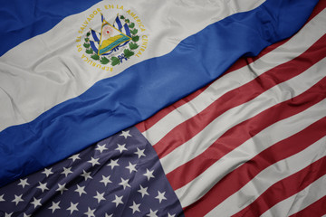 Canvas Print - waving colorful flag of united states of america and national flag of el salvador.