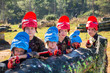 © JackF - Kids paintball players aiming outdoors