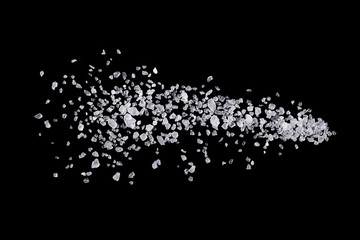 A heap of sea salt on black background.