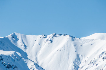 Wall Mural - mountains in winter, snow capped peaks, mountain winter landscape