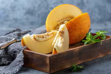 Wall Mural - Slices of ripe yellow melon.