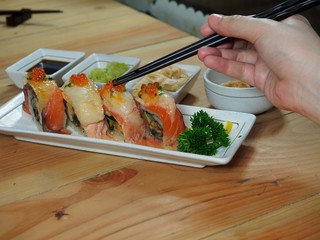 Wall Mural - sushi with chopsticks