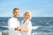 © Pixel-Shot - Happy mature couple at sea resort
