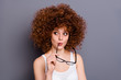 © deagreez - Close up photo of pretty foxy lady look wondered empty space think over tricky action wear specs white tank-top isolated grey background