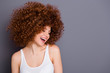 © deagreez - Close up photo of volume hairdo lady natural cool curls laughing nice joke wear white tank-top isolated grey background